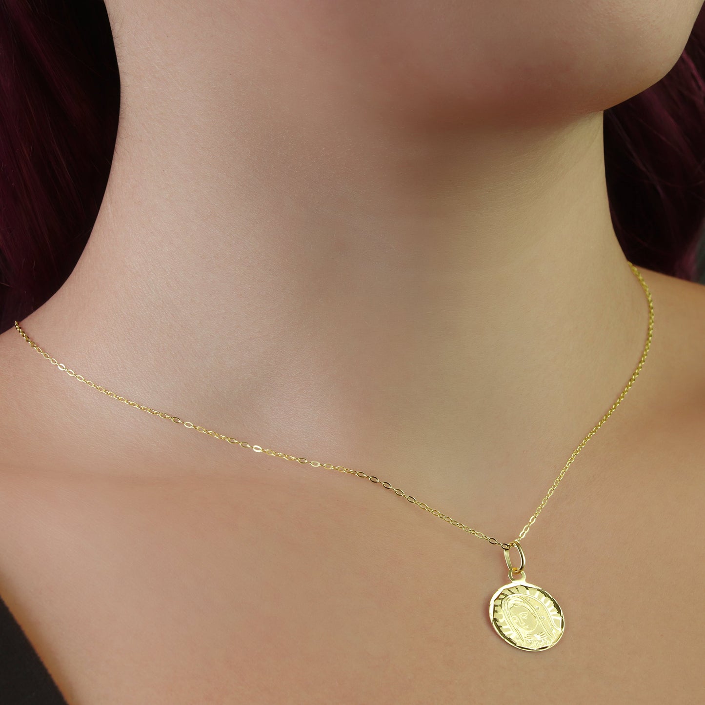 GIOVE MIO: Exclusive 18kt Yellow Gold Virgin of Guadalupe Medal - Elevate your faith with style and elegance with this beautiful religious piece. Make it yours now!