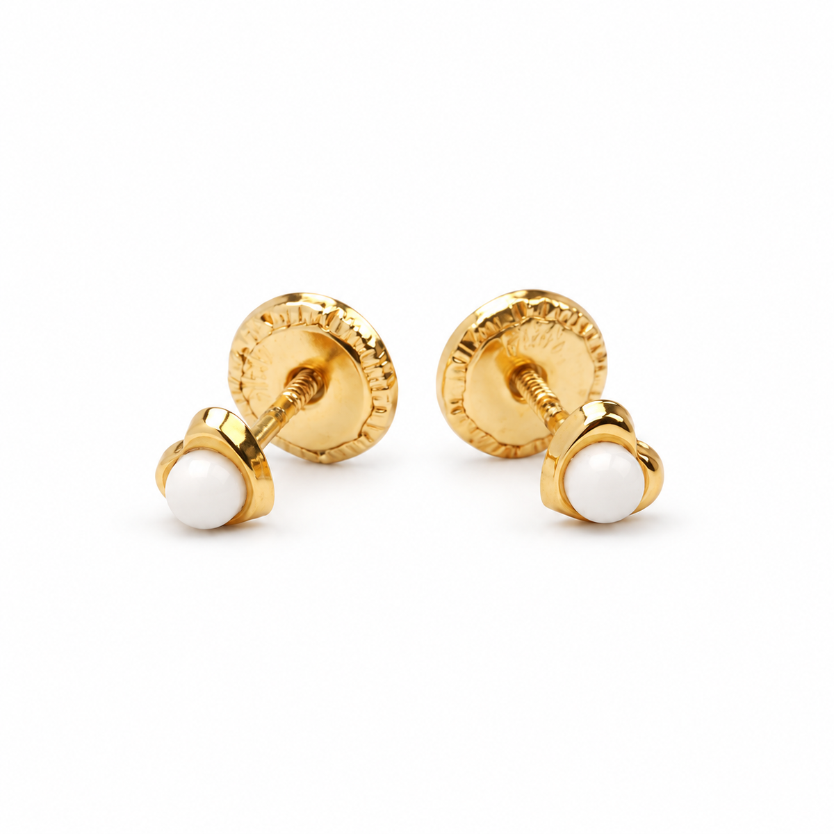 Par de aretes de bebé en oro amarillo de 18Kt con centro blanco.