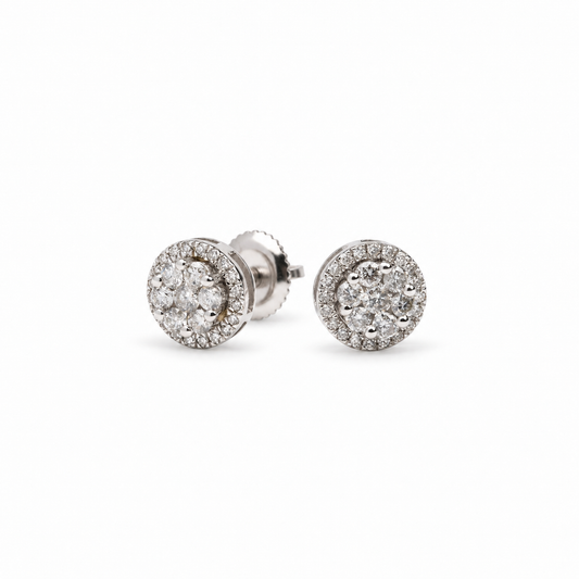 Par de studs de diamantes naturales en oro blanco 14 kt, diámetro 7.5 mm.