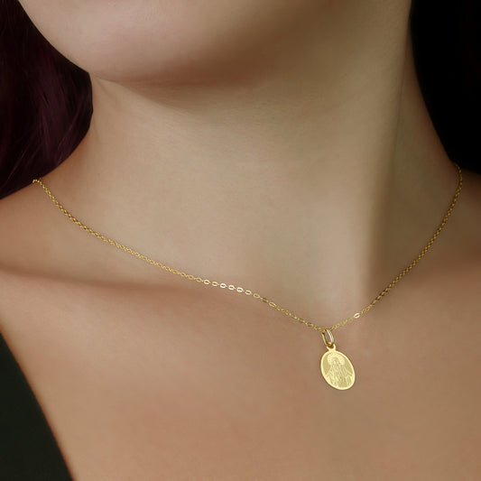 GIOVE MIO: Virgin Mary Miraculous Medal in 18kt Yellow Gold. Protect and bless in style! Elevate your faith with this exquisite religious jewel. Make it yours now!