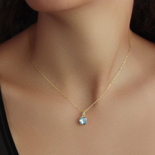 GIOVE MIO Blue Topaz Pendant in 14kt Gold - 1 Swiss Blue Topaz 2.16ct. Sparkle with this elegant blue topaz pendant! Elevate your style with a touch of glamour! Upgrade your look now!